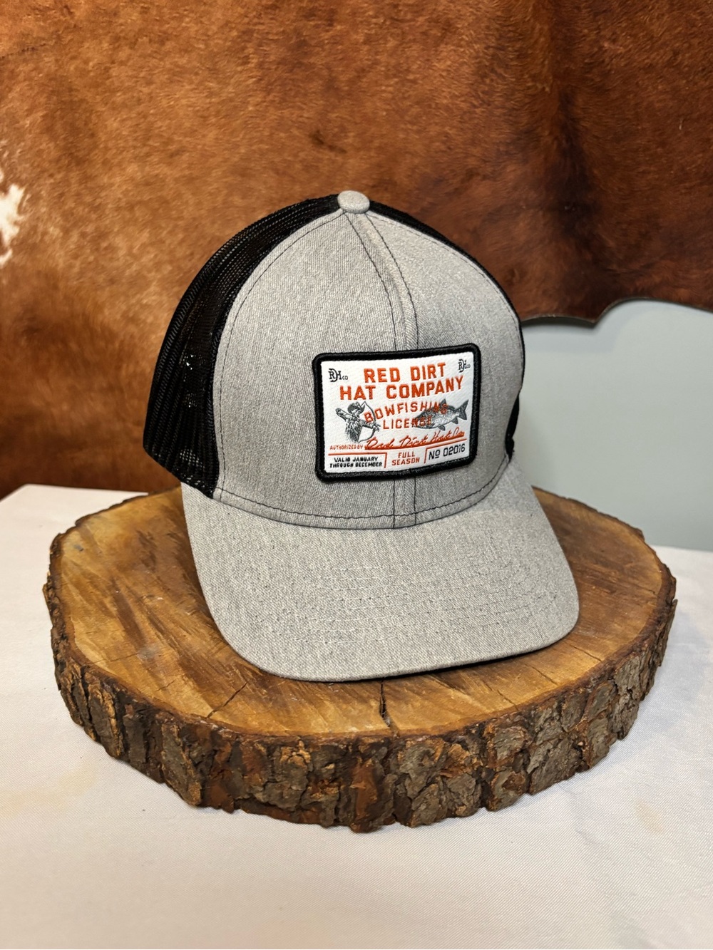Red Dirt Hat Company Bowfishing License Trucker Snapback Hat | Gray & Black Mesh